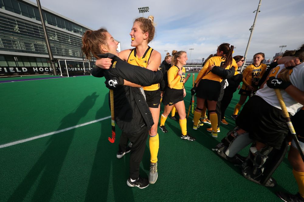 Iowa Hawkeyes Ellie Holley (7) hugs Grace McGuire (62) following their game against the Michigan Wolverines in the semi-finals of the Big Ten Tournament Friday, November 2, 2018 at Lakeside Field on the campus of Northwestern University in Evanston, Ill. (Brian Ray/hawkeyesports.com)