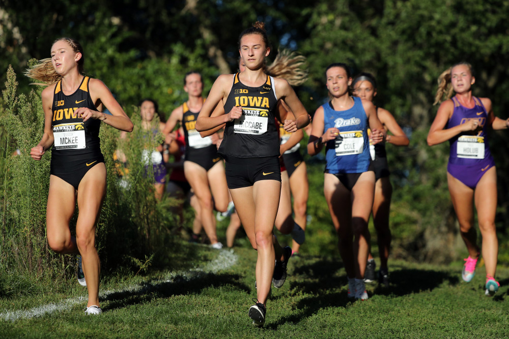 IowaÕs Jessica McKee and Grace McCabe runs in the 2019 Hawkeye Invitational Friday, September 6, 2019 at the Ashton Cross Country Course. (Brian Ray/hawkeyesports.com)