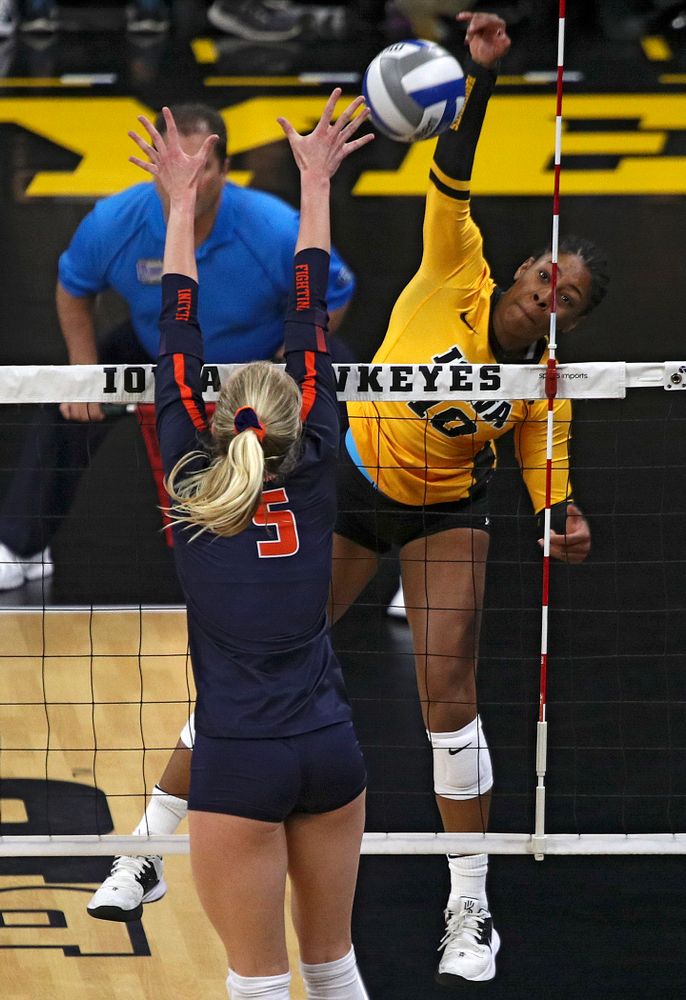 Iowa’s Griere Hughes (10) gets a kill during the first set of their match against Illinois at Carver-Hawkeye Arena in Iowa City on Wednesday, Nov 6, 2019. (Stephen Mally/hawkeyesports.com)