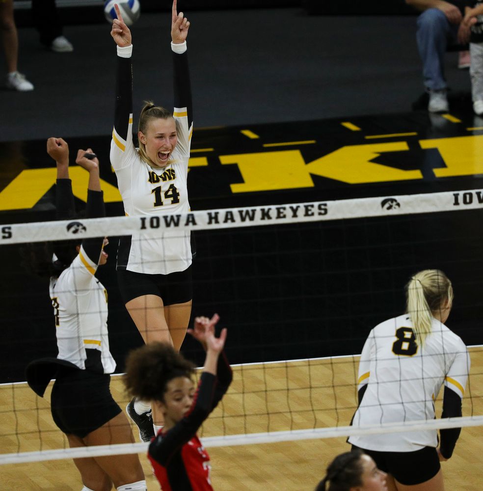 Iowa Hawkeyes outside hitter Cali Hoye (14) celebrates after winning a point during a match against Rutgers at Carver-Hawkeye Arena on November 2, 2018. (Tork Mason/hawkeyesports.com)