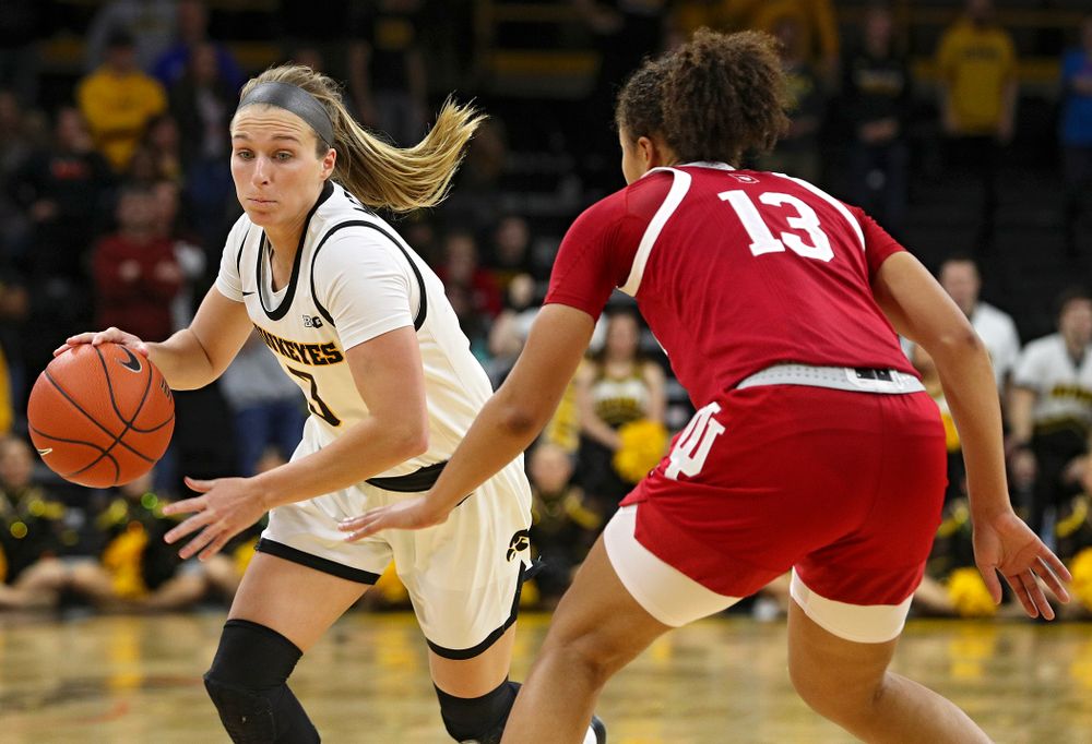 Iowa Hawkeyes guard Makenzie Meyer (3) drives in on Indiana Hoosiers guard Jaelynn Penn (13) during the second overtime period of their game at Carver-Hawkeye Arena in Iowa City on Sunday, January 12, 2020. (Stephen Mally/hawkeyesports.com)
