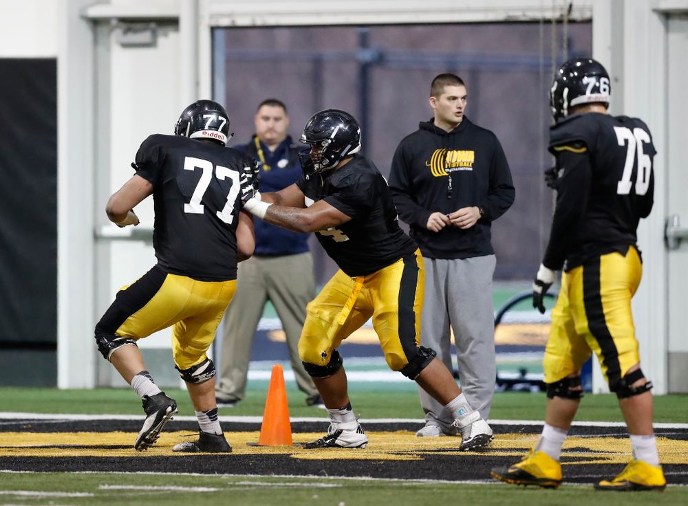 Iowa Hawkeyes offensive lineman Alaric Jackson (77) and offensive lineman Tristan Wirfs (74) during spring practice No. 13 Wednesday, April 18, 2018 at the Hansen Football Performance Center. (Brian Ray/hawkeyesports.com)