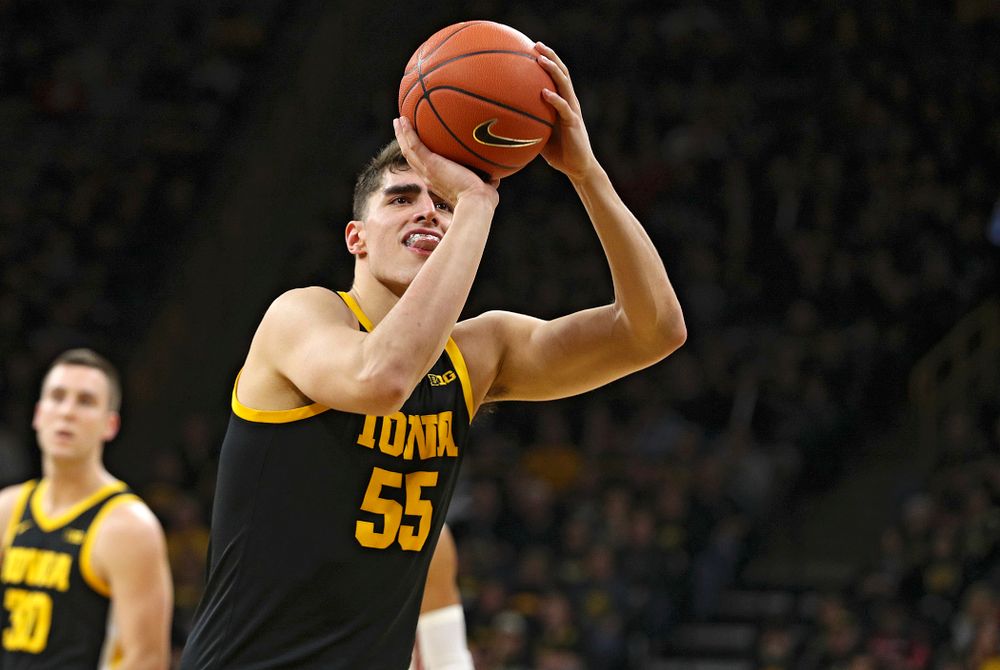 Iowa Hawkeyes center Luka Garza (55) makes a free throw during the first half of their game at Carver-Hawkeye Arena in Iowa City on Monday, January 27, 2020. (Stephen Mally/hawkeyesports.com)