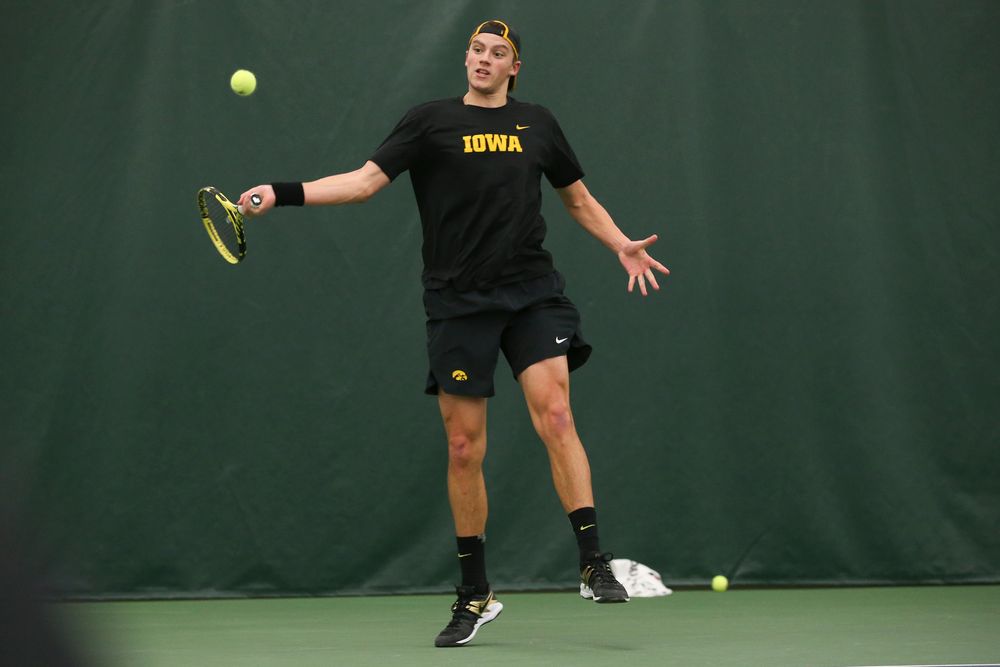 Iowa’s Joe Tyler returns a hit during the Iowa men’s tennis meet vs VCU  on Saturday, February 29, 2020 at the Hawkeye Tennis and Recreation Complex. (Lily Smith/hawkeyesports.com)
