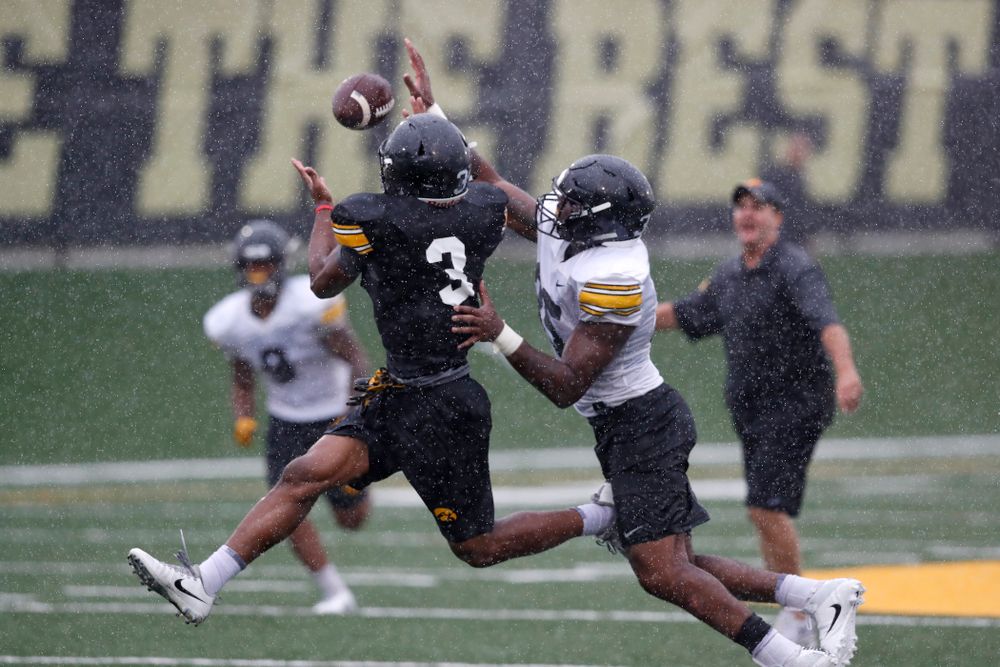 Iowa Hawkeyes wide receiver Tyrone Tracy Jr. (3) and linebacker Barrington Wade (35) during camp practice No. 15  Monday, August 20, 2018 at the Hansen Football Performance Center. (Brian Ray/hawkeyesports.com)