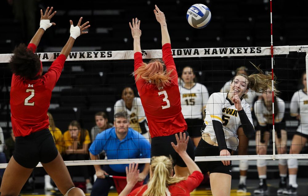 Iowa Hawkeyes outside hitter Meghan Buzzerio (5) spikes the ball during a match against Maryland at Carver-Hawkeye Arena on November 23, 2018. (Tork Mason/hawkeyesports.com)