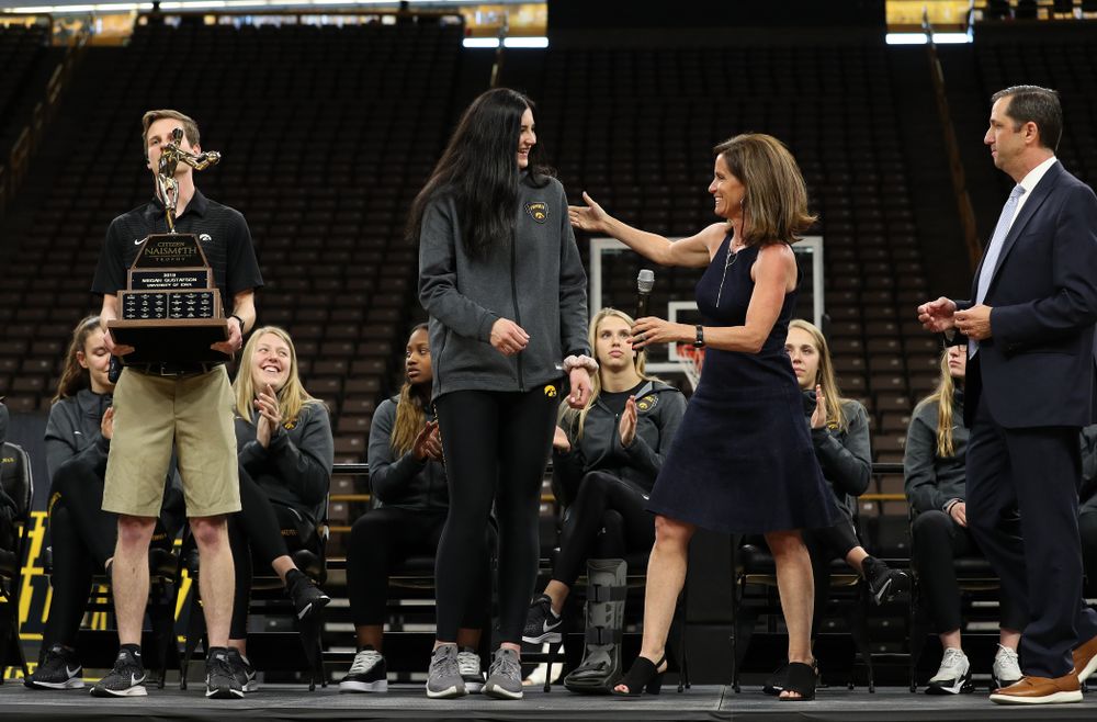 Iowa Hawkeyes forward Megan Gustafson (10) is presented with the Naismith Player Of The Year Trophy during the teamÕs Celebr-Eight event Wednesday, April 24, 2019 at Carver-Hawkeye Arena. (Brian Ray/hawkeyesports.com)