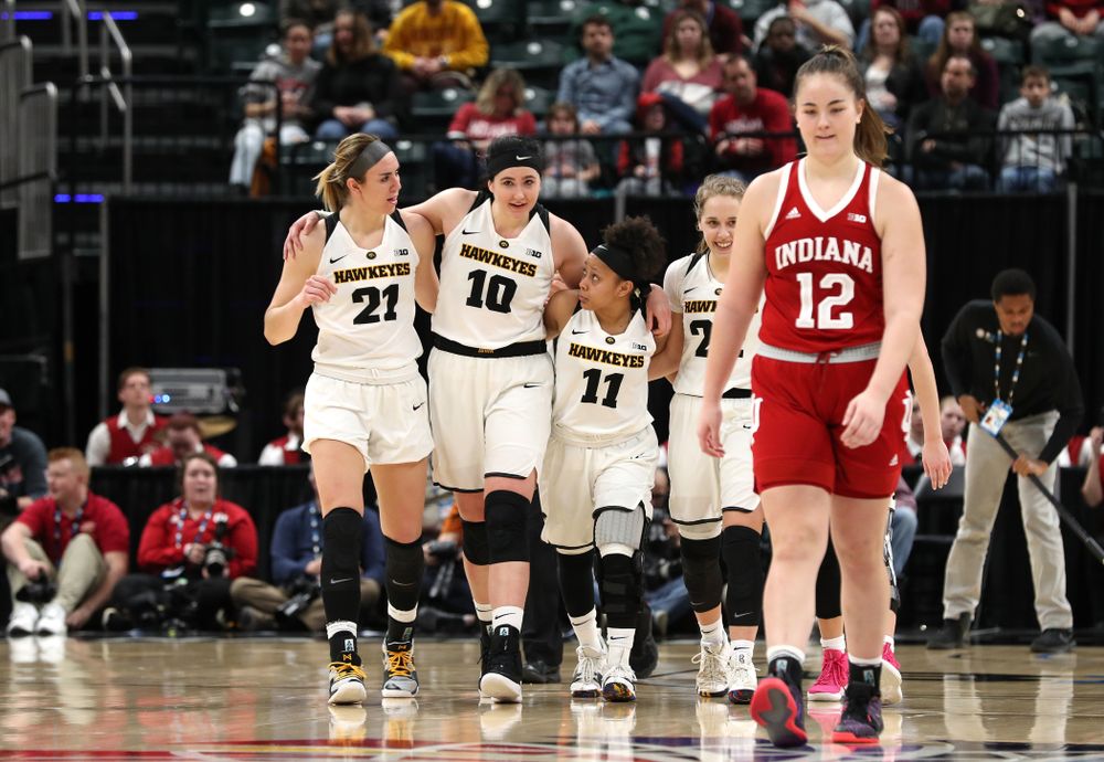 Iowa Hawkeyes forward Hannah Stewart (21), forward Megan Gustafson (10), and guard Tania Davis (11) against the Indiana Hoosiers in the quarterfinals of the Big Ten Tournament Friday, March 8, 2019 at Bankers Life Fieldhouse in Indianapolis, Ind. (Brian Ray/hawkeyesports.com)