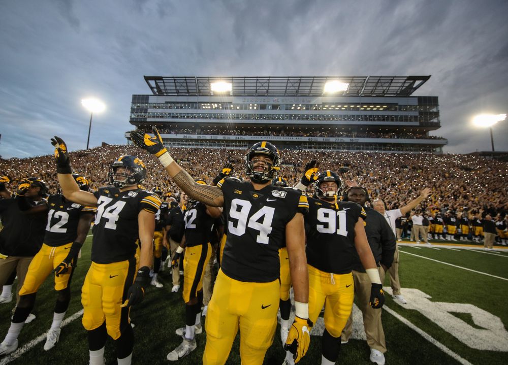 Iowa Hawkeyes defensive end A.J. Epenesa (94) waves to the Stead Family ChildrenÕs Hospital during their game against the Miami RedHawks Saturday, August 31, 2019 at Kinnick Stadium in Iowa City. (Brian Ray/hawkeyesports.com)