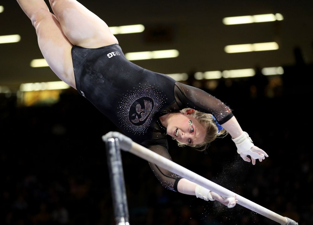 Iowa’s Elinor Rogers competes on the bars against Michigan Friday, February 14, 2020 at Carver-Hawkeye Arena. (Brian Ray/hawkeyesports.com)