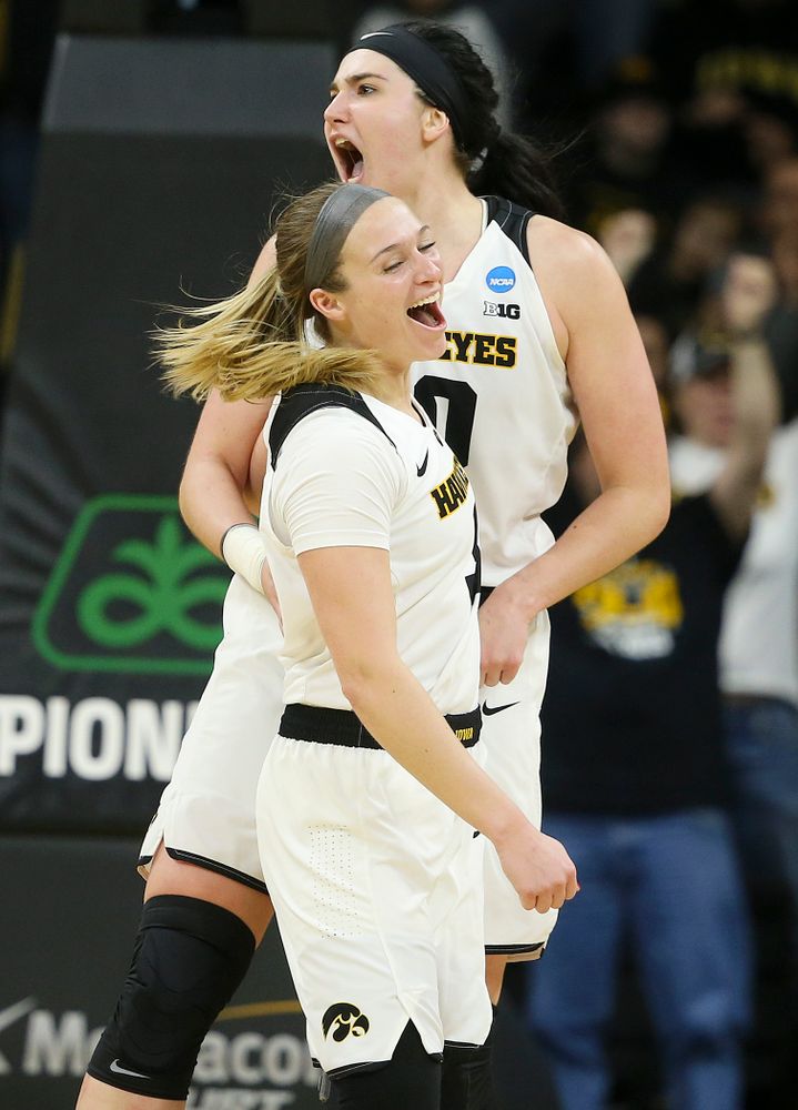 Iowa Hawkeyes guard Makenzie Meyer (3) and center Megan Gustafson (10) are pumped up during the fourth quarter of their second round game in the 2019 NCAA Women's Basketball Tournament at Carver Hawkeye Arena in Iowa City on Sunday, Mar. 24, 2019. (Stephen Mally for hawkeyesports.com)