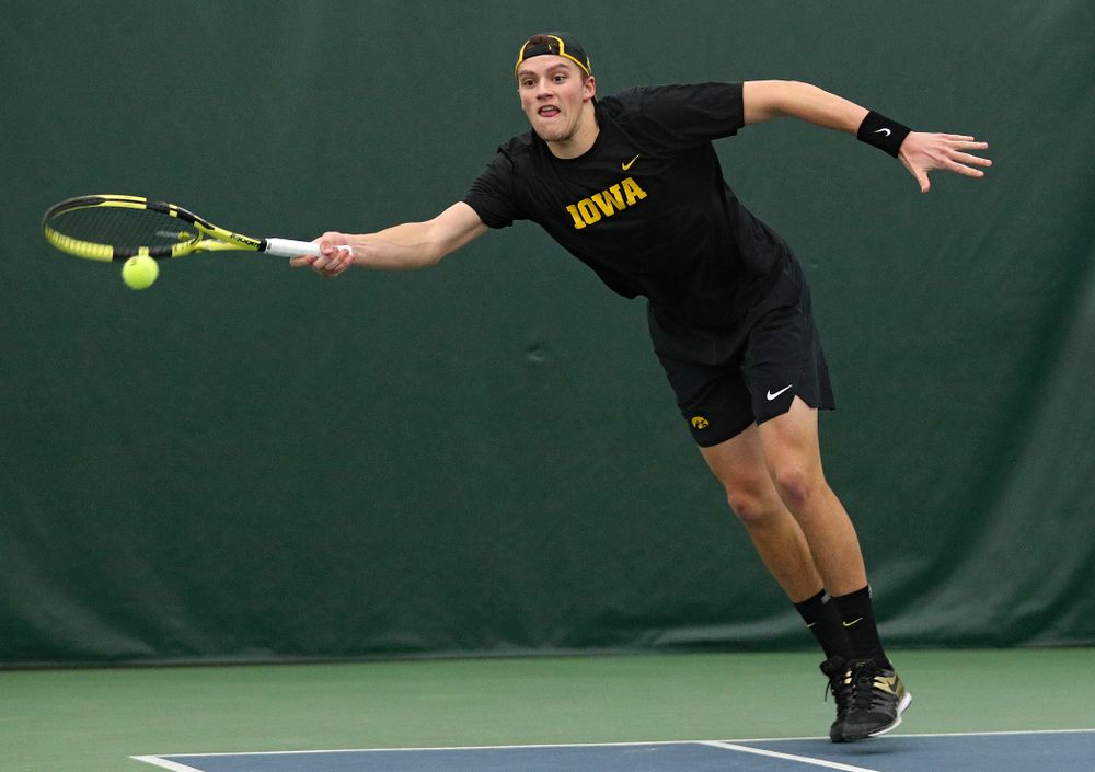 Iowa’s Joe Tyler returns a shot during his singles match at the Hawkeye Tennis and Recreation Complex in Iowa City on Friday, March 6, 2020. (Stephen Mally/hawkeyesports.com)