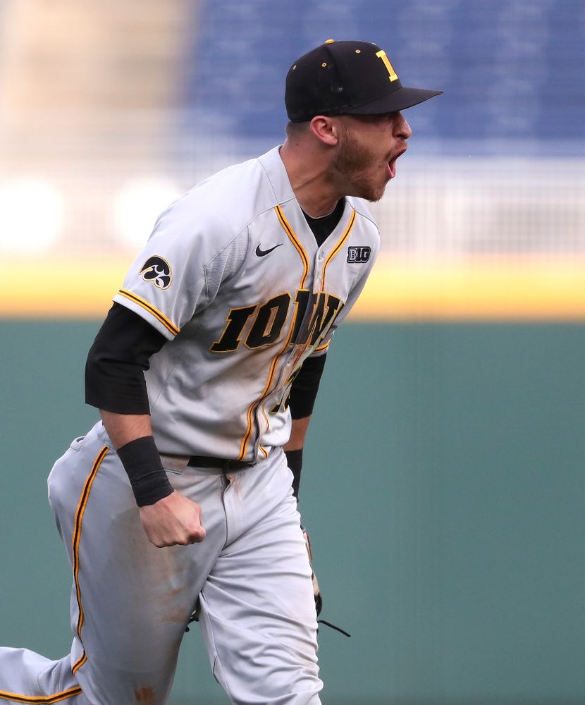 Iowa Hawkeyes Tanner Wetrich (16) celebrates after tuning a double play against the Indiana Hoosiers in the first round of the Big Ten Baseball Tournament Wednesday, May 22, 2019 at TD Ameritrade Park in Omaha, Neb. (Brian Ray/hawkeyesports.com)