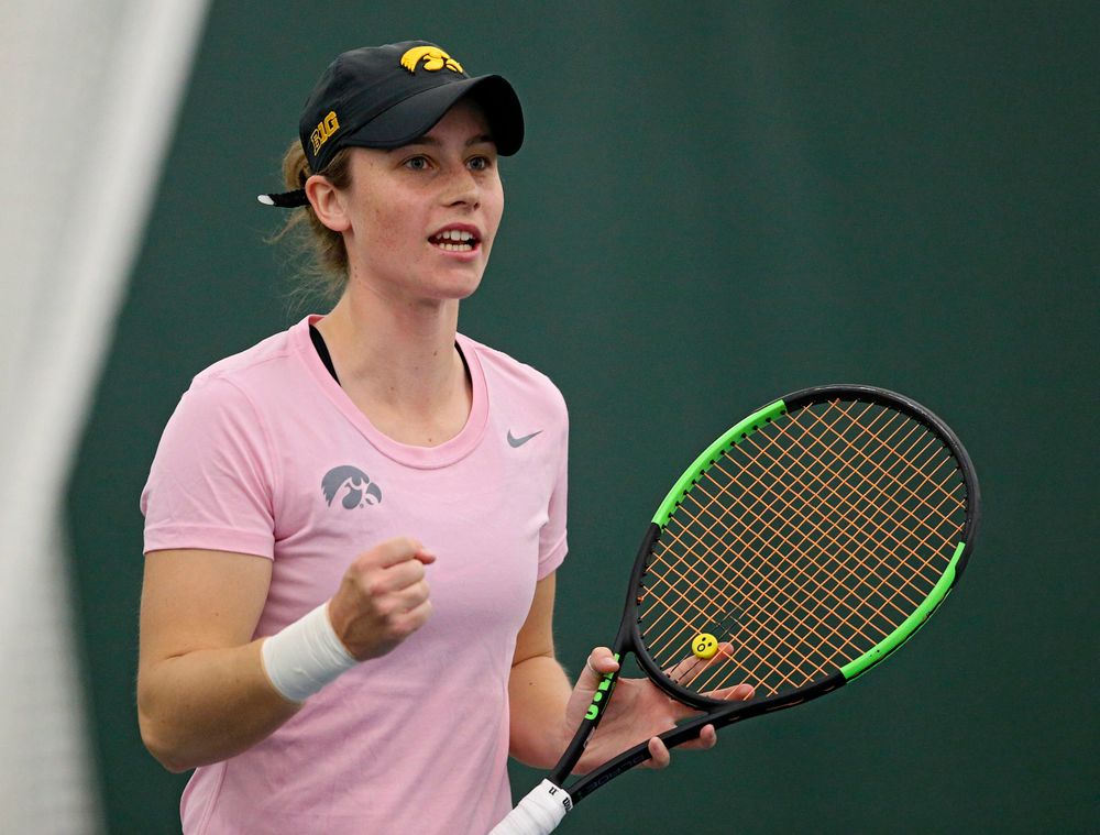 Iowa's Elise van Heuvelen Treadwell celebrates a score during their doubles match against Purdue at the Hawkeye Tennis and Recreation Complex in Iowa City on Friday, Mar. 29, 2019. (Stephen Mally/hawkeyesports.com)