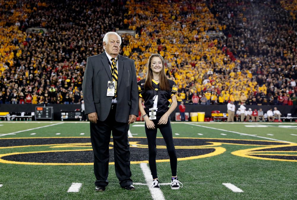 Honorary Captain Tom Moore and Kid Captain Kiersten Mann before the Iowa Hawkeyes game against the Wisconsin Badgers Saturday, September 22, 2018 at Kinnick Stadium. (Brian Ray/hawkeyesports.com)