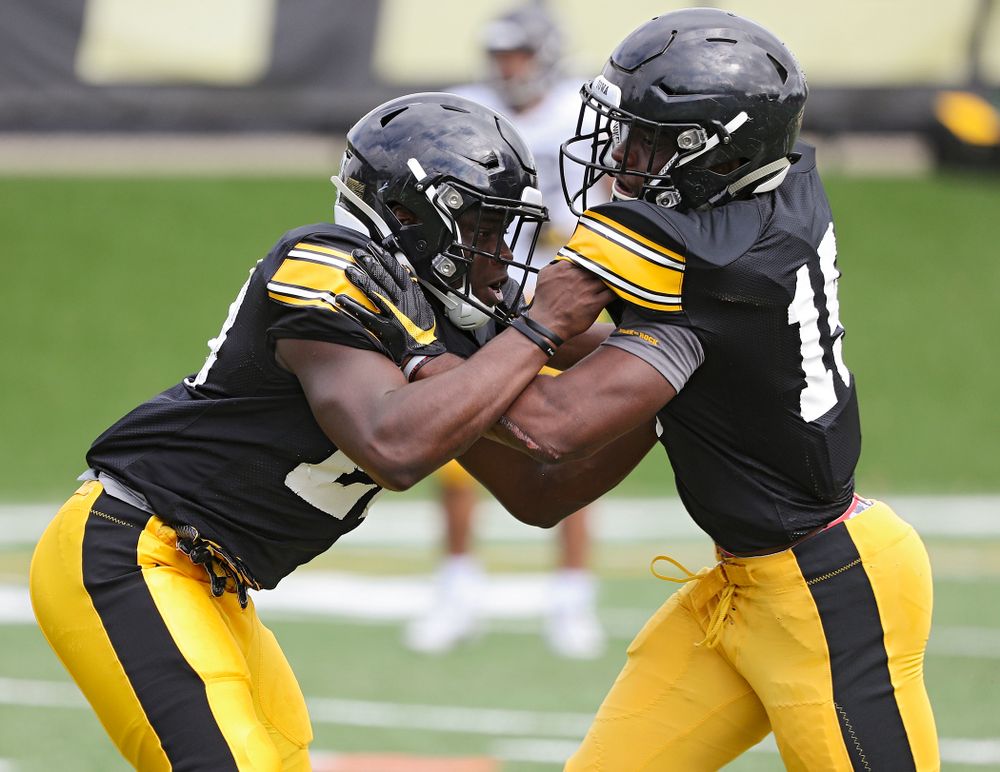 Iowa Hawkeyes running back Shadrick Byrd (23) and running back Tyler Goodson (15) run a drill during Fall Camp Practice No. 10 at the Hansen Football Performance Center in Iowa City on Tuesday, Aug 13, 2019. (Stephen Mally/hawkeyesports.com)