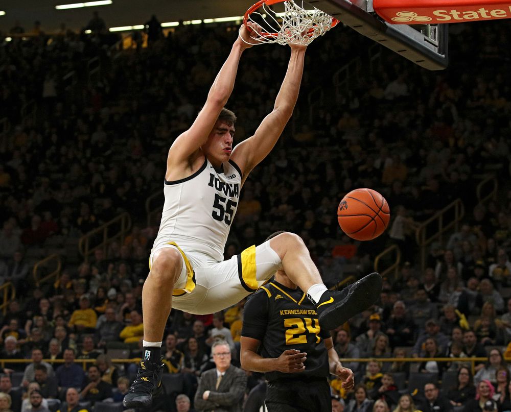 Iowa Hawkeyes center Luka Garza (55) dunks the ball during the second half of their their game at Carver-Hawkeye Arena in Iowa City on Sunday, December 29, 2019. (Stephen Mally/hawkeyesports.com)