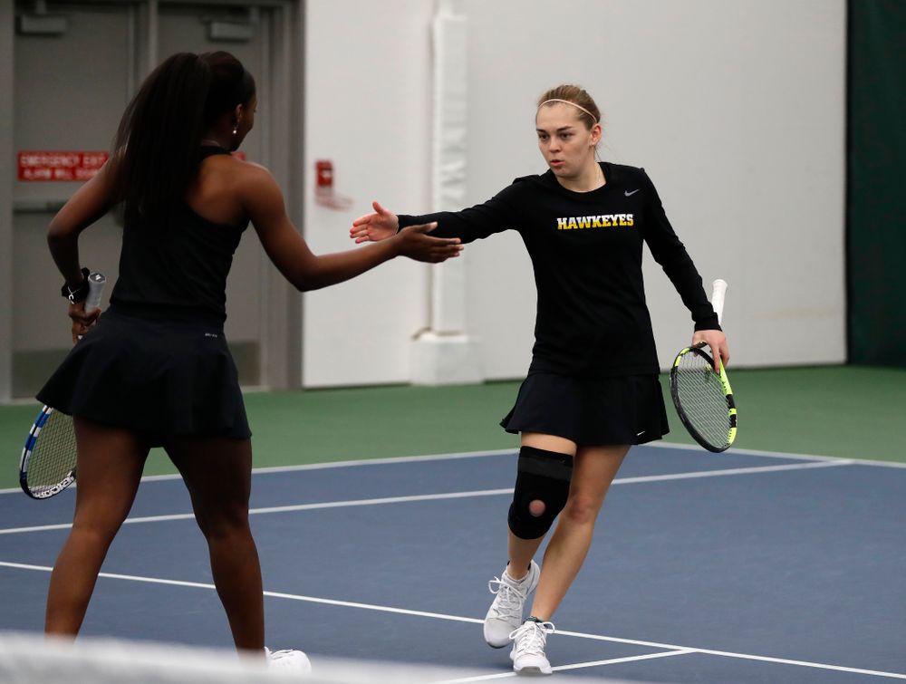 Adorable Huckleby and Zoe Douglas play a doubles match against Ohio State Sunday, March 25, 2018 at the Hawkeye Tennis and Recreation Center. (Brian Ray/hawkeyesports.com)