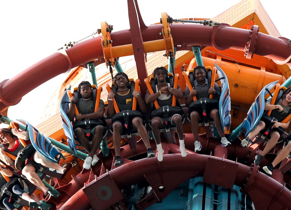 Iowa Hawkeyes defensive back Devonte Young (17), wide receiver Brandon Smith (12), wide receiver Ihmir Smith-Marsette (6), and and running backs coach Derrick Foster ride Falcon's Fury during an Outback Bowl team event Saturday, December 29, 2018 at Busch Gardens in Tampa, FL. (Brian Ray/hawkeyesports.com)