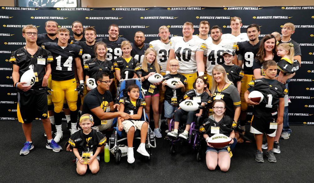 The Hawkeye Football Seniors with the Kids Captains during Kids Day Saturday, August 11, 2018 at Kinnick Stadium. (Brian Ray/hawkeyesports.com)