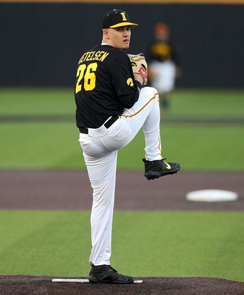 Iowa pitcher Adam Ketelsen (26) delivers to the plate during the eighth inning of their college baseball game at Duane Banks Field in Iowa City on Tuesday, March 10, 2020. (Stephen Mally/hawkeyesports.com)