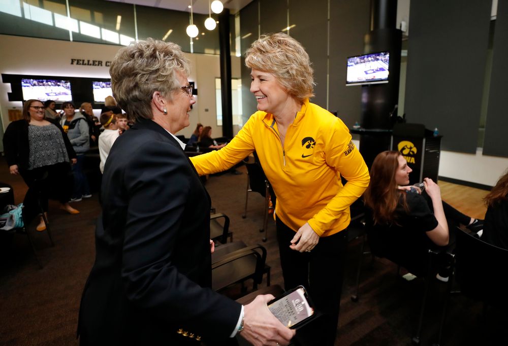 Iowa Hawkeye Head Coach Lisa Bluder hugs Deputy Athletics Director Barbara Burke after finding out their seed in the 2018 NCAA Women's Basketball Tournament  Monday, March 12, 2018 at Carver-Hawkeye Arena. (Brian Ray/hawkeyesports.com)