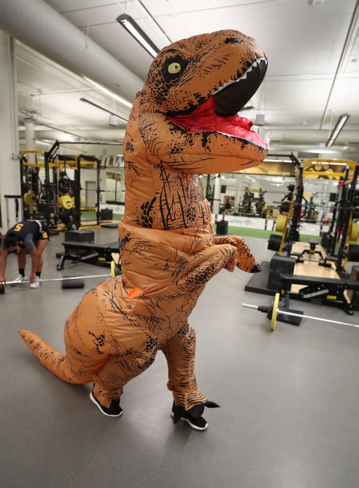 Iowa Hawkeyes head coach Lisa Bluder  surprises her team during a workout dressed as a T-Rex for Halloween  Wednesday, October 31, 2018 at Carver-Hawkeye Arena. (Brian Ray/hawkeyesports.com)
