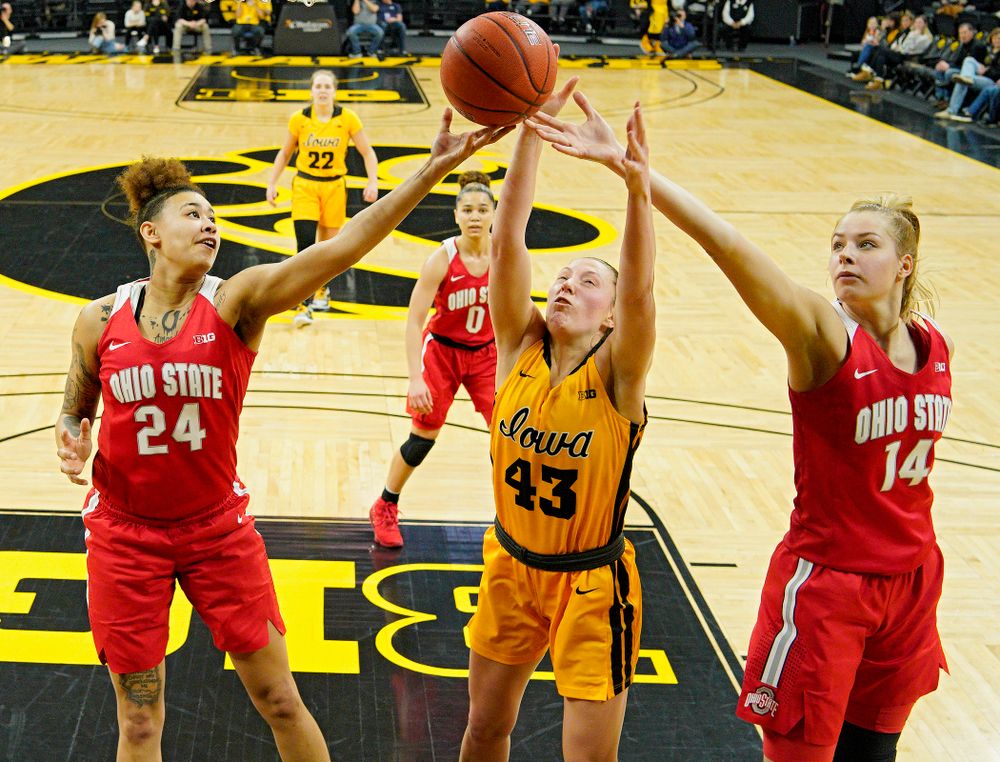 Iowa Hawkeyes forward Amanda Ollinger (43) battles for a rebound during the second quarter of their game at Carver-Hawkeye Arena in Iowa City on Thursday, January 23, 2020. (Stephen Mally/hawkeyesports.com)