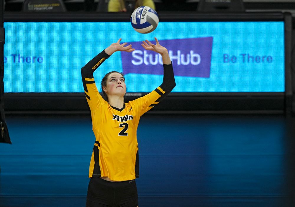 Iowa’s Courtney Buzzerio (2) sets the ball during the second set of their match against Illinois at Carver-Hawkeye Arena in Iowa City on Wednesday, Nov 6, 2019. (Stephen Mally/hawkeyesports.com)