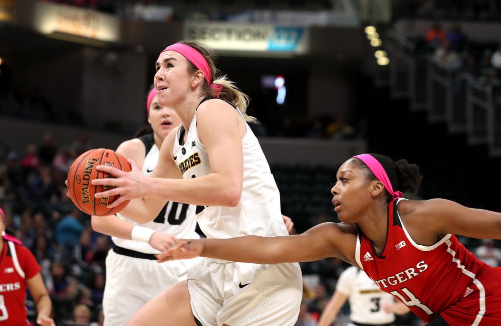 Iowa Hawkeyes forward Hannah Stewart (21) against the Rutgers Scarlet Knights in the semi-finals of the Big Ten Tournament Saturday, March 9, 2019 at Bankers Life Fieldhouse in Indianapolis, Ind. (Brian Ray/hawkeyesports.com)