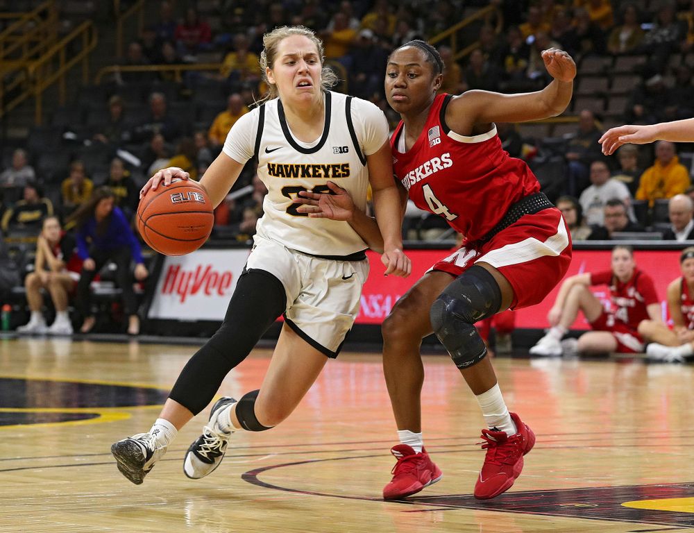 Iowa Hawkeyes guard Kathleen Doyle (22) drives with the ball during the third quarter of the game at Carver-Hawkeye Arena in Iowa City on Thursday, February 6, 2020. (Stephen Mally/hawkeyesports.com)