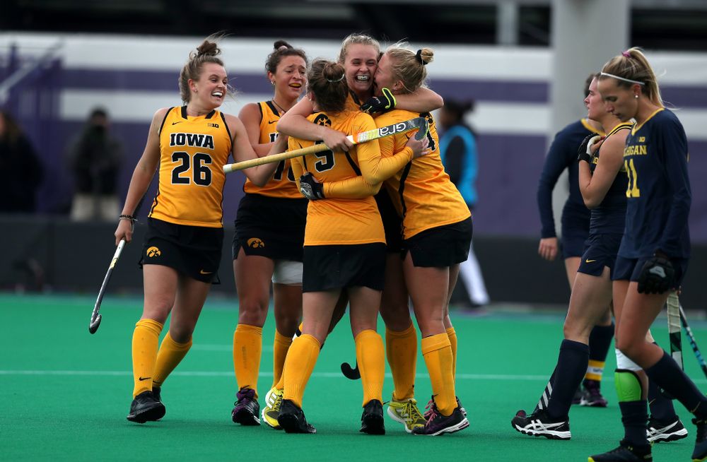 Iowa Hawkeyes Katie Birch (11) and Makenna Grewe (4) celebrate the game winning goal against the Michigan Wolverines in the semi-finals of the Big Ten Tournament Friday, November 2, 2018 at Lakeside Field on the campus of Northwestern University in Evanston, Ill. (Brian Ray/hawkeyesports.com)