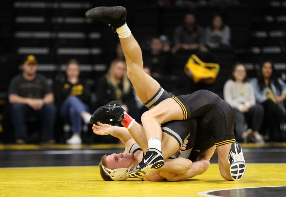 Iowa's Kaleb Young wrestles Purdue's Griffin Parriott at 157 pounds Saturday, November 24, 2018 at Carver-Hawkeye Arena. (Brian Ray/hawkeyesports.com)