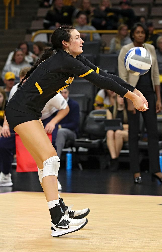 Iowa’s Halle Johnston (4) gets a dig during the second set of their volleyball match at Carver-Hawkeye Arena in Iowa City on Sunday, Oct 13, 2019. (Stephen Mally/hawkeyesports.com)