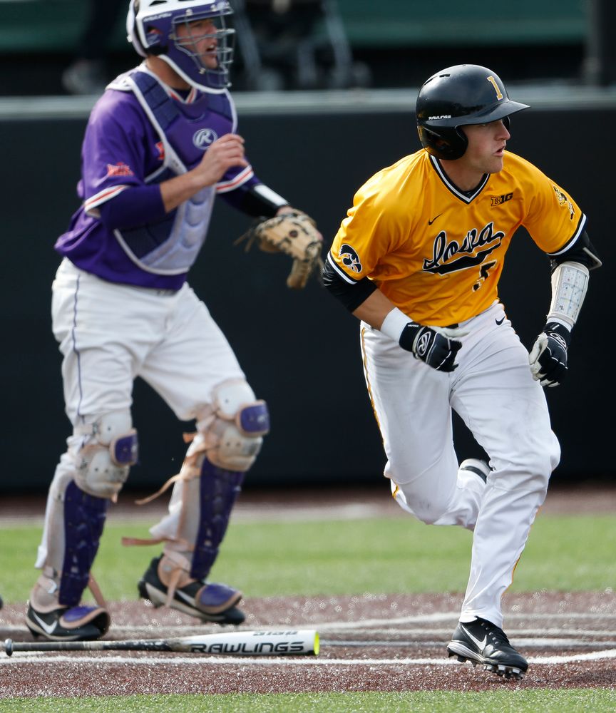 Iowa Hawkeyes catcher Tyler Cropley (5) runs to first base during a game against Evansville at Duane Banks Field on March 18, 2018. (Tork Mason/hawkeyesports.com)