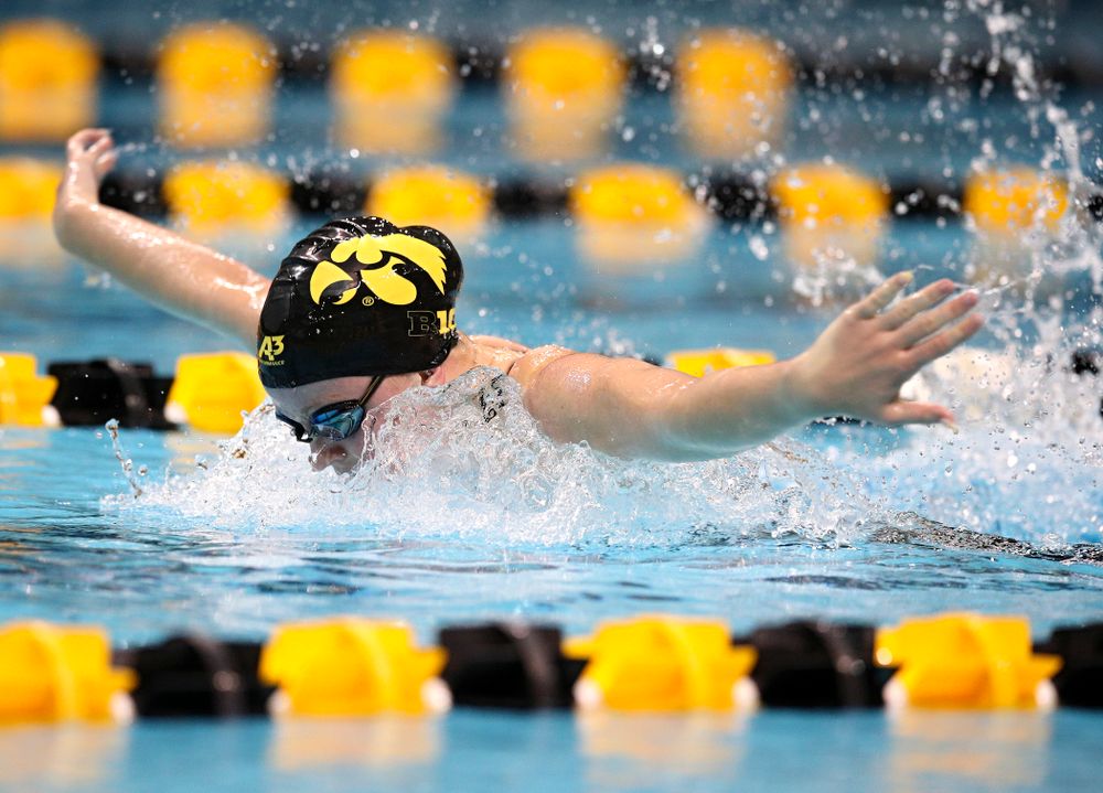 Iowa’s Alleyna Thomas swims the women’s 100 yard butterfly event during their meet at the Campus Recreation and Wellness Center in Iowa City on Friday, February 7, 2020. (Stephen Mally/hawkeyesports.com)