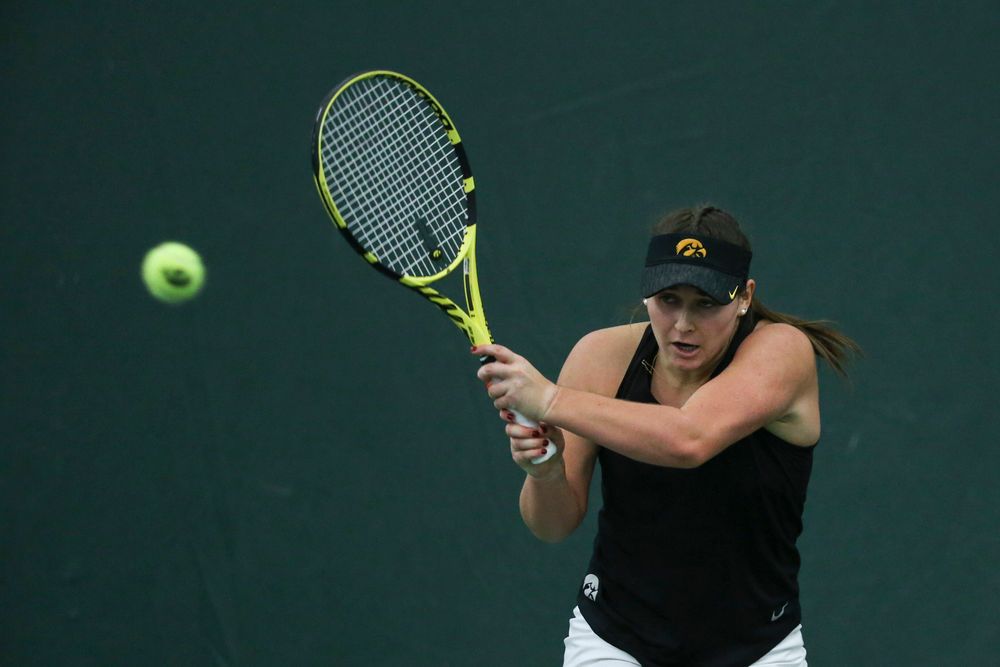 Iowa’s Danielle Bauers returns a hit during the Iowa women’s tennis meet vs DePaul  on Friday, February 21, 2020 at the Hawkeye Tennis and Recreation Complex. (Lily Smith/hawkeyesports.com)