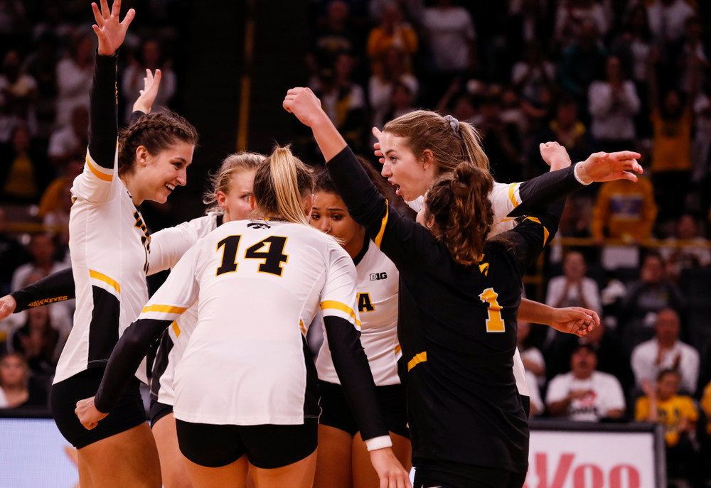 Iowa Hawkeyes middle blocker Sarah Wing (13) and outside hitter Meghan Buzzerio (5) against the Michigan State Spartans Friday, September 21, 2018 at Carver-Hawkeye Arena. (Brian Ray/hawkeyesports.com)