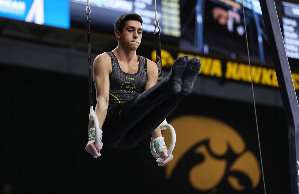 Iowa's Andrew Herrador competes on the rings against Oklahoma Saturday, February 9, 2019 at Carver-Hawkeye Arena. (Brian Ray/hawkeyesports.com)