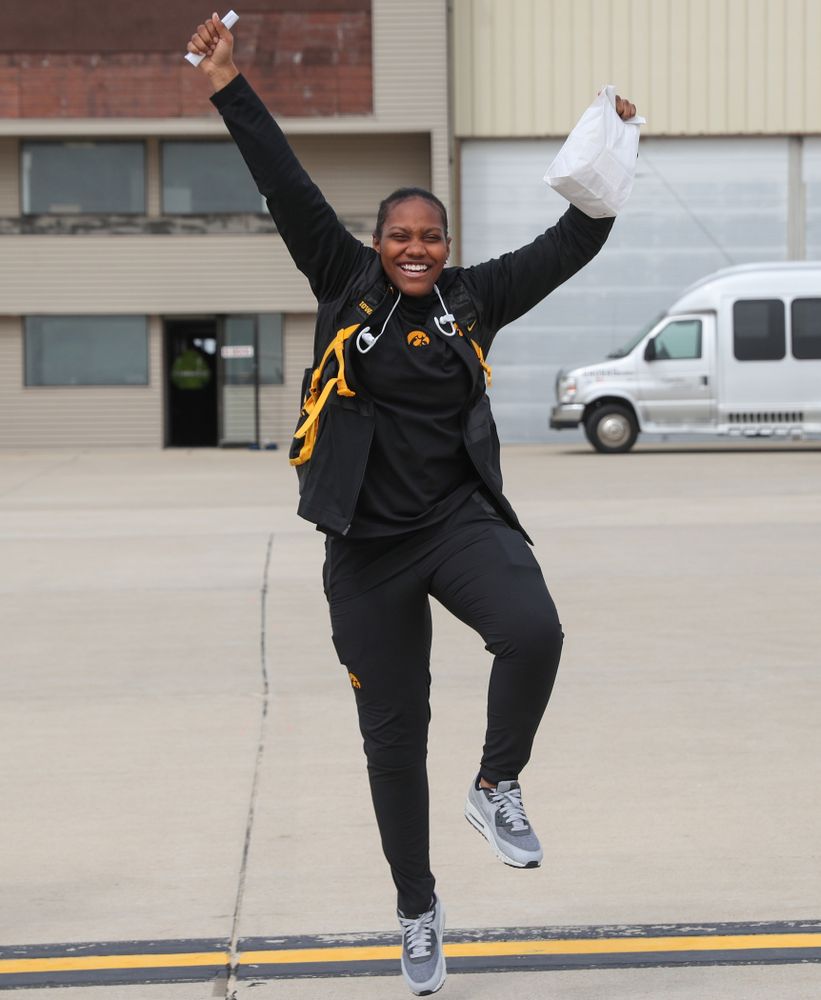 Iowa Hawkeyes guard Zion Sanders (24) boards the team plane to Greensboro, NC for the Regionals of the 2019 NCAA Women's Basketball Championships Thursday, March 28, 2019 at the Eastern Iowa Airport. (Brian Ray/hawkeyesports.com)