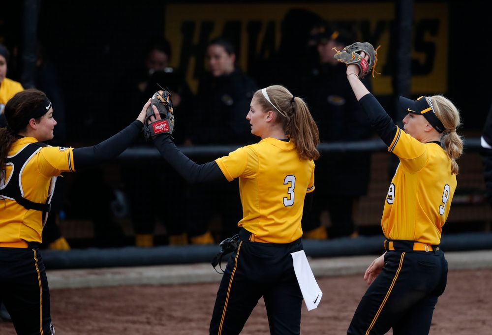 Iowa Hawkeyes starting pitcher/relief pitcher Allison Doocy (3), infielder Taylor Libby (4), and infielder Sarah Kurtz (9) against UW Green Bay Tuesday, March 27, 2018 at Bob Pearl Field. (Brian Ray/hawkeyesports.com)