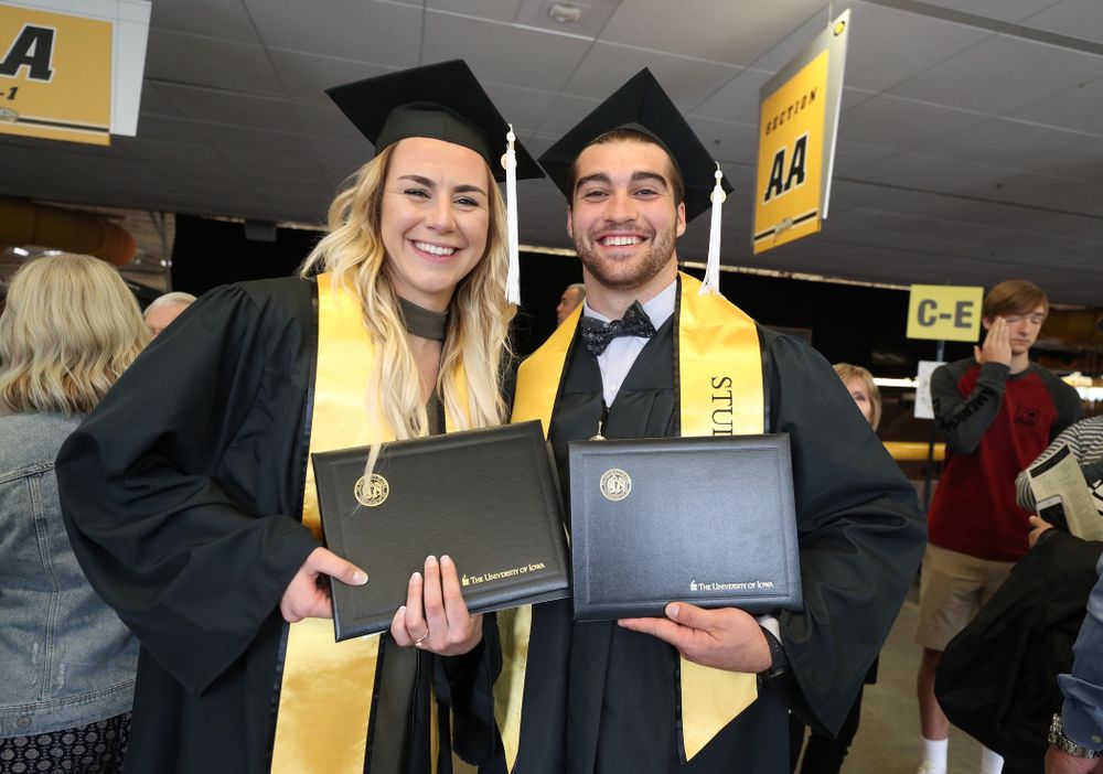 Iowa WomenÕs BasketballÕs Hannah Stewart and Iowa FootballÕs Garret Jansen during the College of Liberal Arts and Sciences spring commencement Saturday, May 11, 2019 at Carver-Hawkeye Arena. (Brian Ray/hawkeyesports.com)
