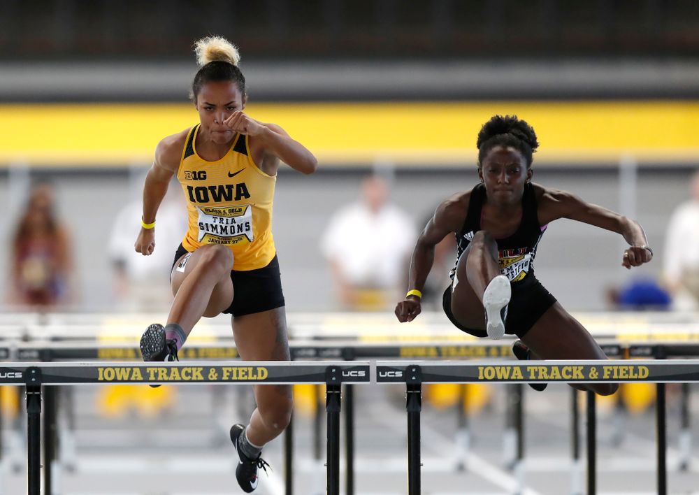 Tria Simmons competes in the 60 meter hurdles 