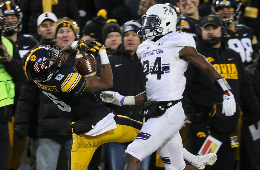 Iowa Hawkeyes wide receiver Ihmir Smith-Marsette (6) makes a catch along the sideline during a game against Northwestern at Kinnick Stadium on November 10, 2018. (Tork Mason/hawkeyesports.com)