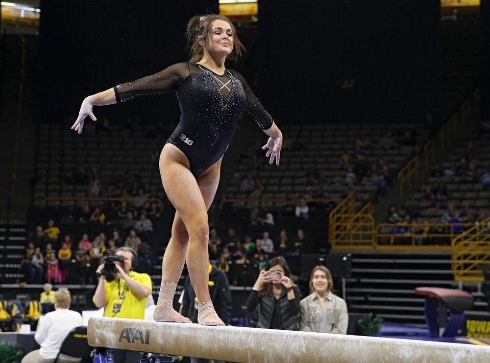Iowa’s Erin Castle competes on the beam during their meet at Carver-Hawkeye Arena in Iowa City on Sunday, March 8, 2020. (Stephen Mally/hawkeyesports.com)