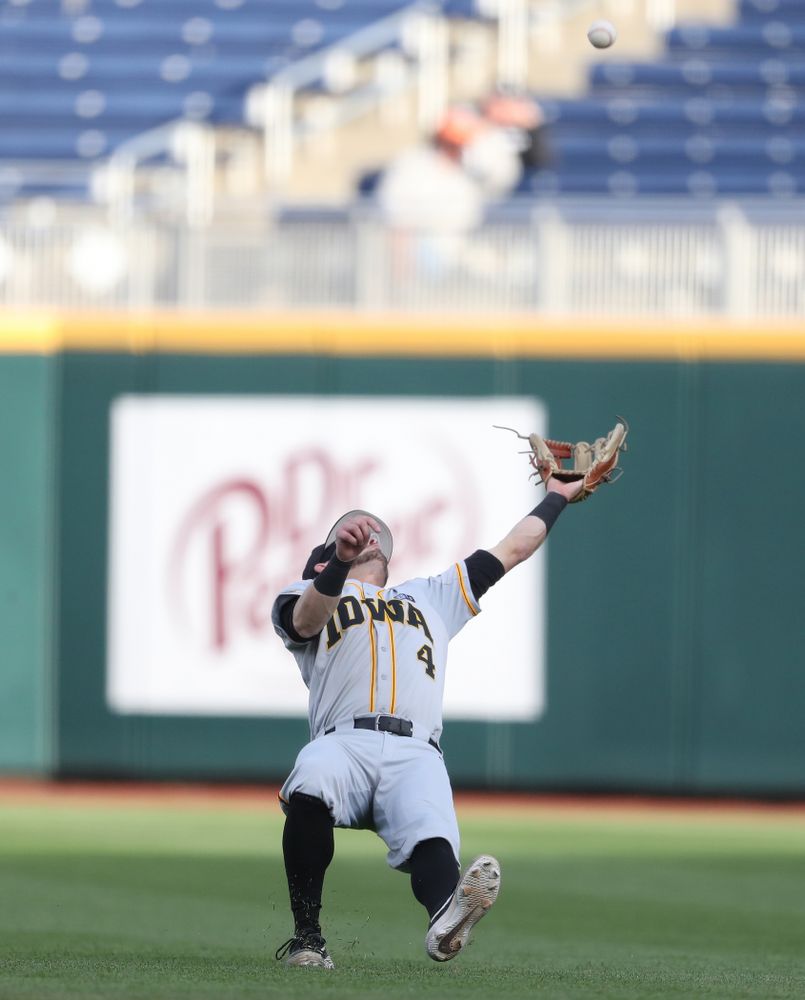 Iowa Hawkeyes infielder Mitchell Boe (4) catches a fly ball against the Indiana Hoosiers in the first round of the Big Ten Baseball Tournament Wednesday, May 22, 2019 at TD Ameritrade Park in Omaha, Neb. (Brian Ray/hawkeyesports.com)