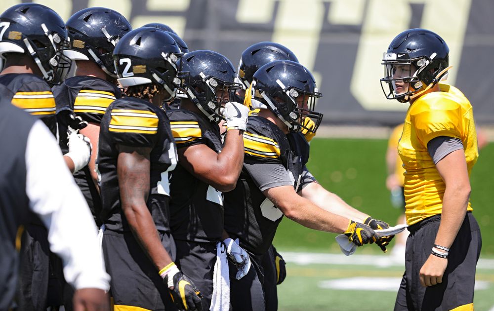 Iowa Hawkeyes quarterback Nate Stanley (4) huddles with the offense during Fall Camp Practice No. 7 at the Hansen Football Performance Center in Iowa City on Friday, Aug 9, 2019. (Stephen Mally/hawkeyesports.com)