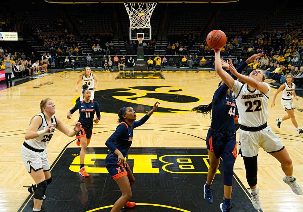 Iowa Hawkeyes guard Kathleen Doyle (22) scores a basket inside during the second quarter of their game at Carver-Hawkeye Arena in Iowa City on Tuesday, December 31, 2019. (Stephen Mally/hawkeyesports.com)