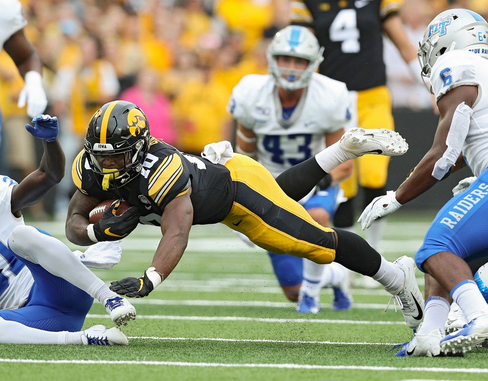 Iowa Hawkeyes running back Mekhi Sargent (10) dives forward for extra yards during the first quarter of their game at Kinnick Stadium in Iowa City on Saturday, Sep 28, 2019. (Stephen Mally/hawkeyesports.com)