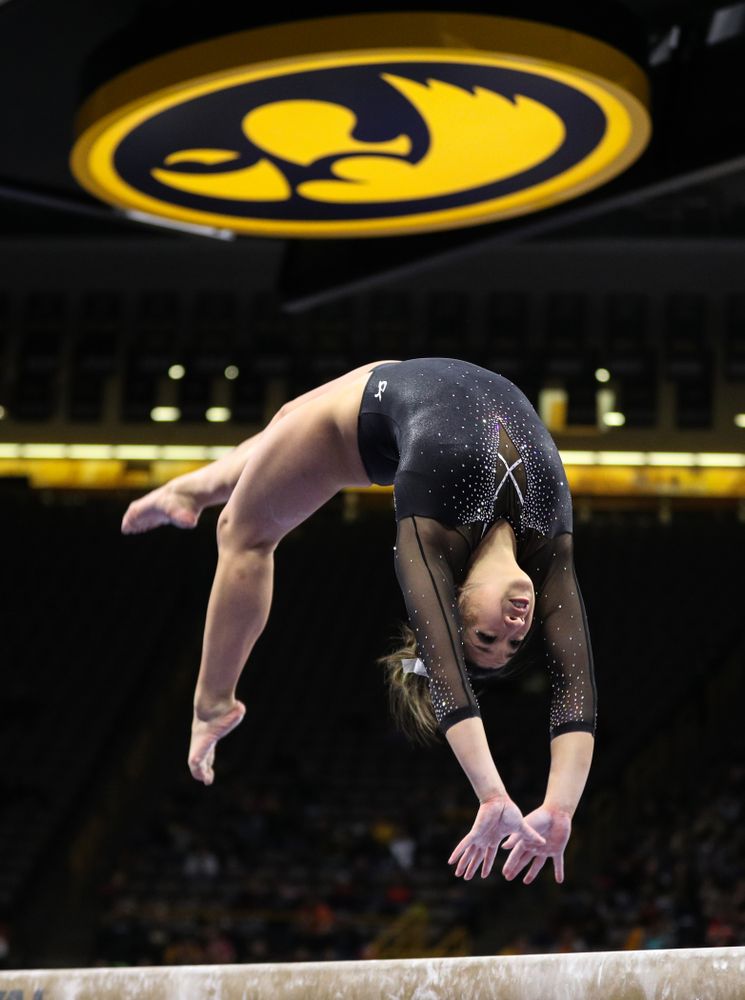Iowa's Nicole Chow competes on the beem against Illinois Saturday, February 16, 2019 at Carver-Hawkeye Arena. (Brian Ray/hawkeyesports.com)